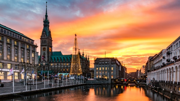 An image of Hamburg, Germany at sunset, with the cityscape in the background